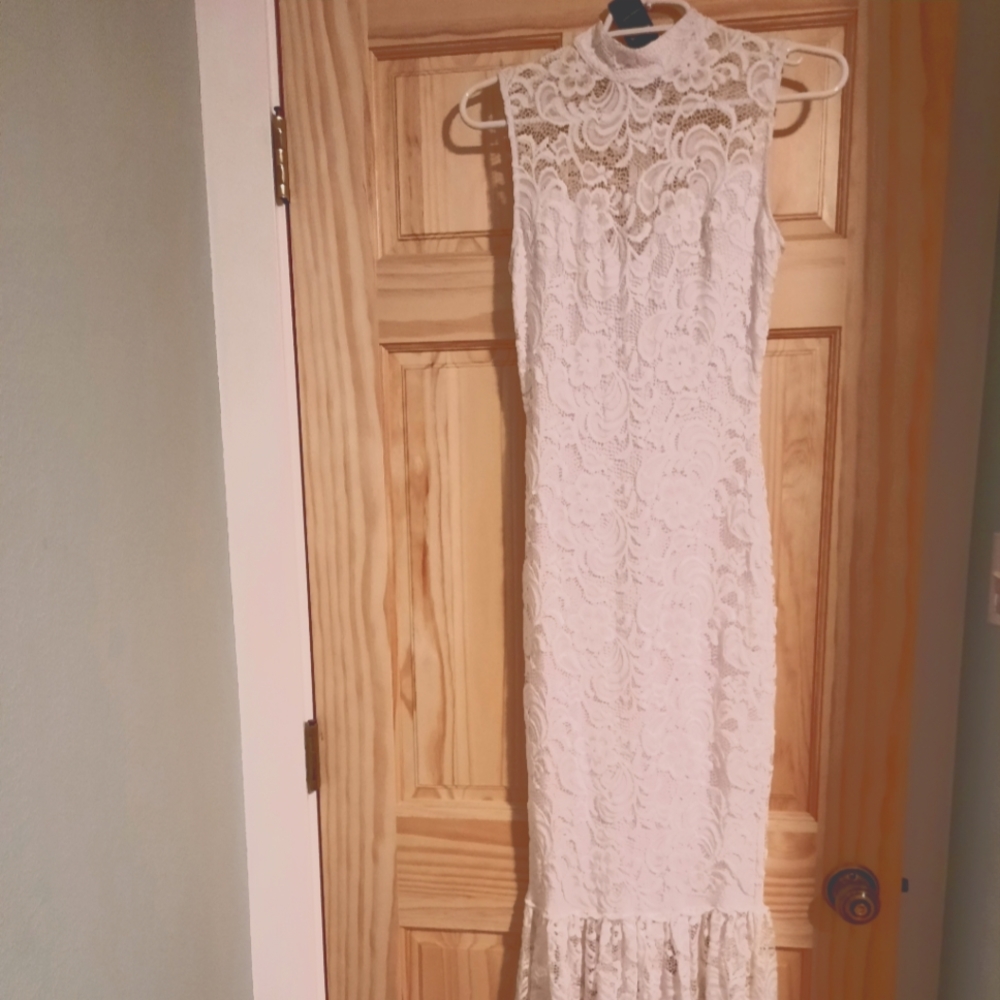 Long white lace wedding dress.Bebe.